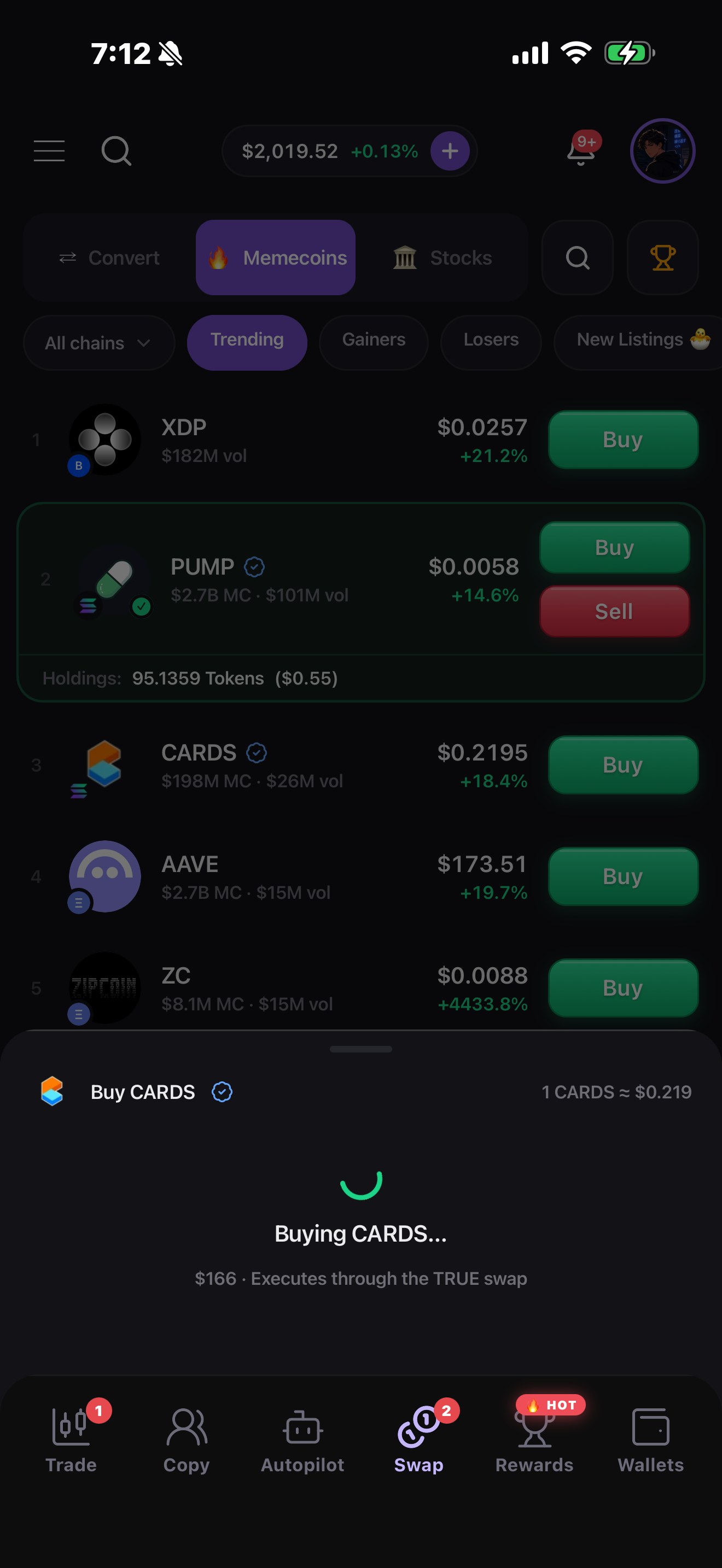 The buy executes through the TRUE swap